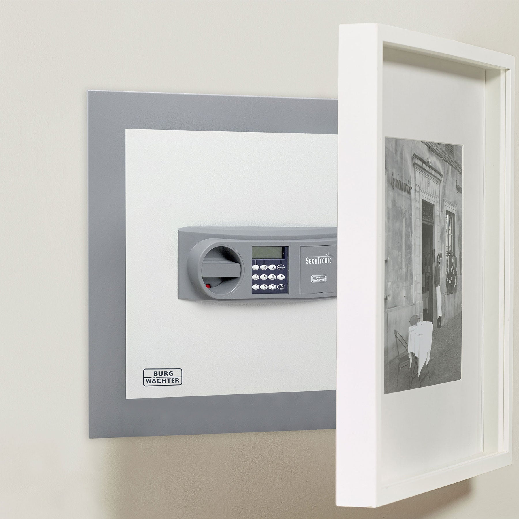 BURG-WÄCHTER Wandtresor hinter einem Bild